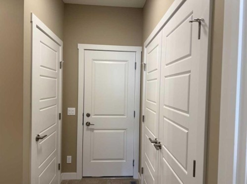 115 Sundown Crescent, Cochrane, AB - Indoor Photo Showing Other Room