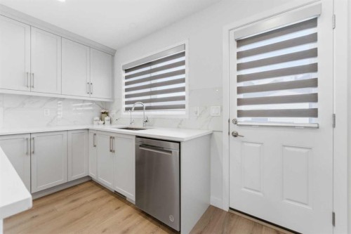 99 Aquila Way Nw, Calgary, AB - Indoor Photo Showing Kitchen
