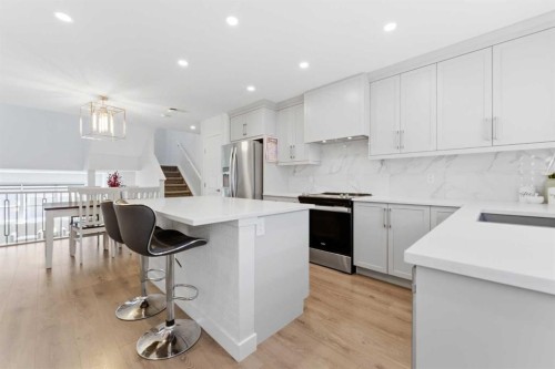 99 Aquila Way Nw, Calgary, AB - Indoor Photo Showing Kitchen With Upgraded Kitchen