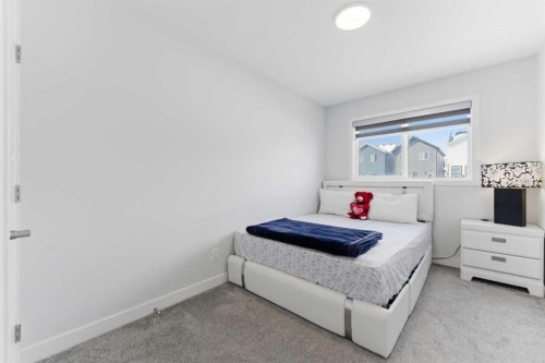 99 Aquila Way Nw, Calgary, AB - Indoor Photo Showing Bedroom