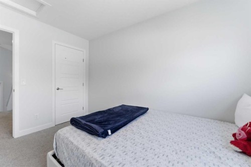 99 Aquila Way Nw, Calgary, AB - Indoor Photo Showing Bedroom