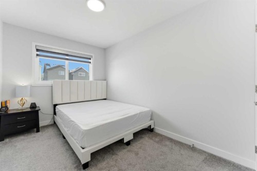 99 Aquila Way Nw, Calgary, AB - Indoor Photo Showing Bedroom