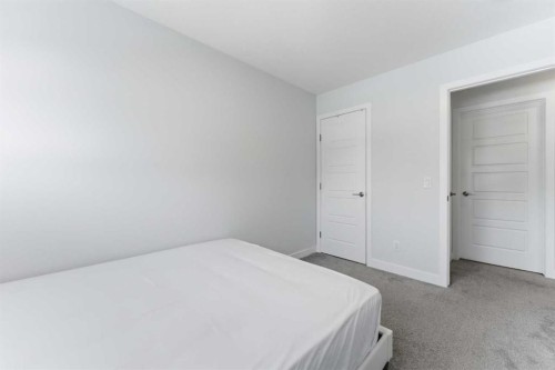 99 Aquila Way Nw, Calgary, AB - Indoor Photo Showing Bedroom