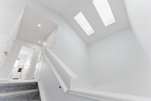 99 Aquila Way Nw, Calgary, AB - Indoor Photo Showing Other Room