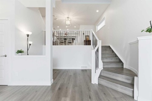 99 Aquila Way Nw, Calgary, AB - Indoor Photo Showing Other Room