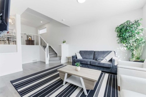 99 Aquila Way Nw, Calgary, AB - Indoor Photo Showing Other Room