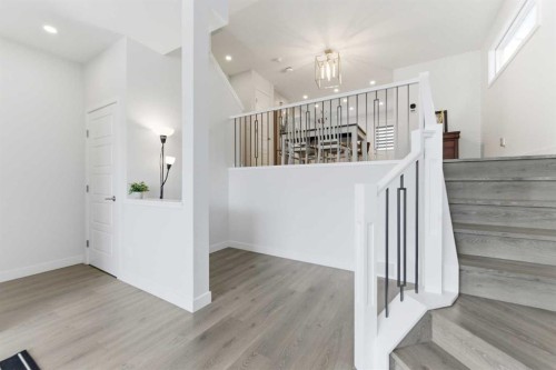 99 Aquila Way Nw, Calgary, AB - Indoor Photo Showing Other Room