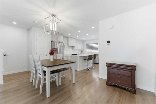 99 Aquila Way Nw, Calgary, AB - Indoor Photo Showing Dining Room