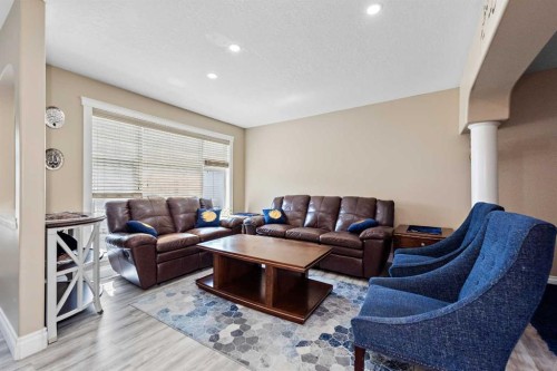 66 Royal Highland Road Nw, Calgary, AB - Indoor Photo Showing Living Room