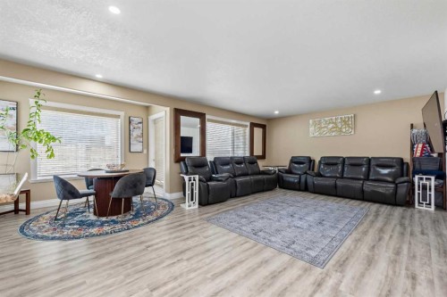 66 Royal Highland Road Nw, Calgary, AB - Indoor Photo Showing Living Room