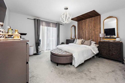66 Royal Highland Road Nw, Calgary, AB - Indoor Photo Showing Bedroom