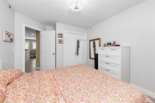 66 Royal Highland Road Nw, Calgary, AB - Indoor Photo Showing Bedroom