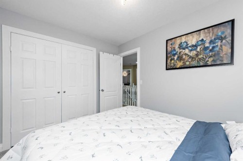 66 Royal Highland Road Nw, Calgary, AB - Indoor Photo Showing Bedroom