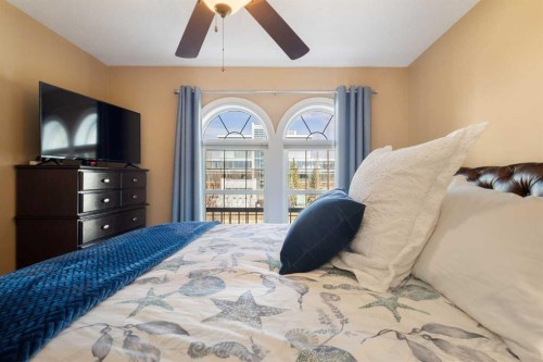 536 Quarry Park Boulevard Se, Calgary, AB - Indoor Photo Showing Bedroom