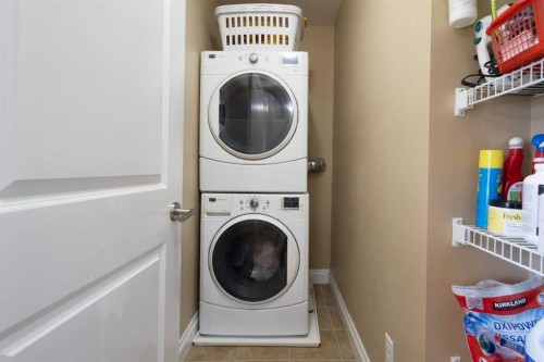 536 Quarry Park Boulevard Se, Calgary, AB - Indoor Photo Showing Laundry Room