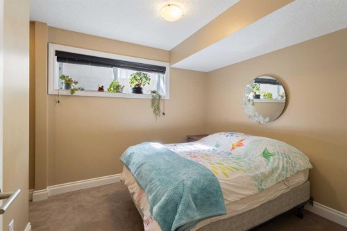536 Quarry Park Boulevard Se, Calgary, AB - Indoor Photo Showing Bedroom