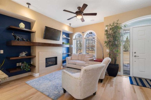536 Quarry Park Boulevard Se, Calgary, AB - Indoor Photo Showing Living Room With Fireplace