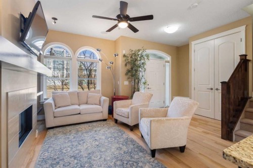 536 Quarry Park Boulevard Se, Calgary, AB - Indoor Photo Showing Living Room With Fireplace