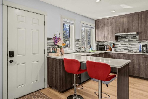 1-1406 2Nd Avenue, Canmore, AB - Indoor Photo Showing Kitchen With Double Sink