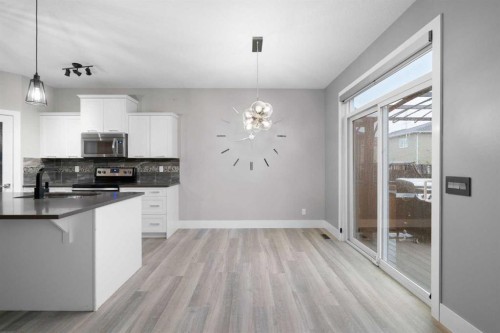 156 Rainbow Falls Heath, Chestermere, AB - Indoor Photo Showing Kitchen