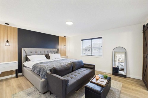 156 Rainbow Falls Heath, Chestermere, AB - Indoor Photo Showing Bedroom