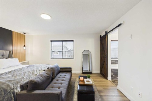 156 Rainbow Falls Heath, Chestermere, AB - Indoor Photo Showing Bedroom