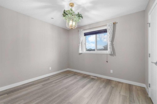 156 Rainbow Falls Heath, Chestermere, AB - Indoor Photo Showing Other Room