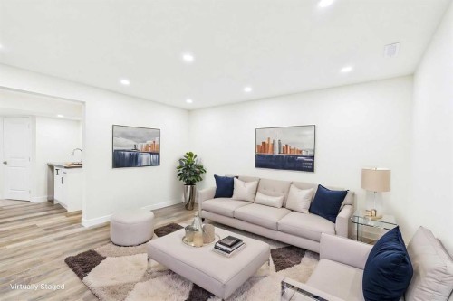 156 Rainbow Falls Heath, Chestermere, AB - Indoor Photo Showing Living Room