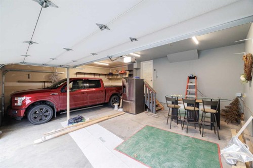 156 Rainbow Falls Heath, Chestermere, AB - Indoor Photo Showing Garage