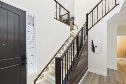 156 Rainbow Falls Heath, Chestermere, AB - Indoor Photo Showing Other Room