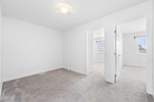 48 Ambleside Crescent Nw, Calgary, AB - Indoor Photo Showing Other Room