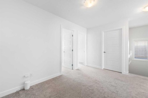 48 Ambleside Crescent Nw, Calgary, AB - Indoor Photo Showing Other Room
