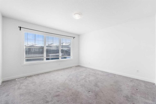 48 Ambleside Crescent Nw, Calgary, AB - Indoor Photo Showing Other Room