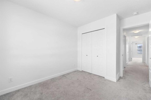 48 Ambleside Crescent Nw, Calgary, AB - Indoor Photo Showing Other Room