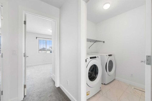 48 Ambleside Crescent Nw, Calgary, AB - Indoor Photo Showing Laundry Room