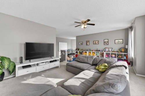 210 West Creek Bay, Chestermere, AB - Indoor Photo Showing Living Room