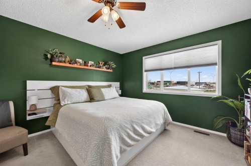 210 West Creek Bay, Chestermere, AB - Indoor Photo Showing Bedroom