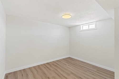 937 Marcombe Drive Ne, Calgary, AB - Indoor Photo Showing Other Room