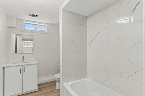 937 Marcombe Drive Ne, Calgary, AB - Indoor Photo Showing Bathroom