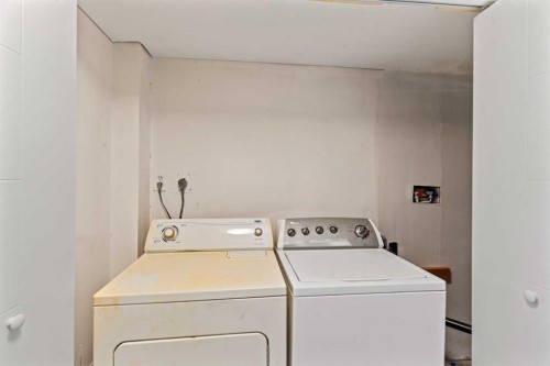 937 Marcombe Drive Ne, Calgary, AB - Indoor Photo Showing Laundry Room