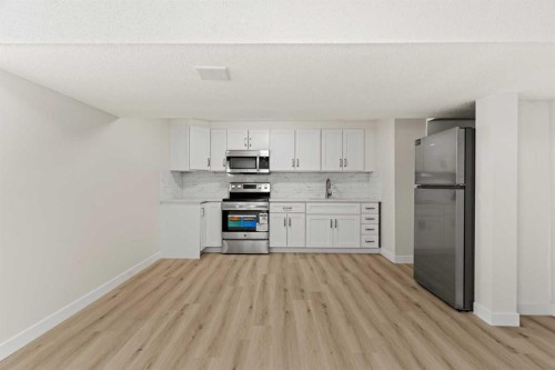 937 Marcombe Drive Ne, Calgary, AB - Indoor Photo Showing Kitchen