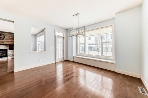 331 Royal Oak Heath Nw, Calgary, AB - Indoor Photo Showing Other Room With Fireplace