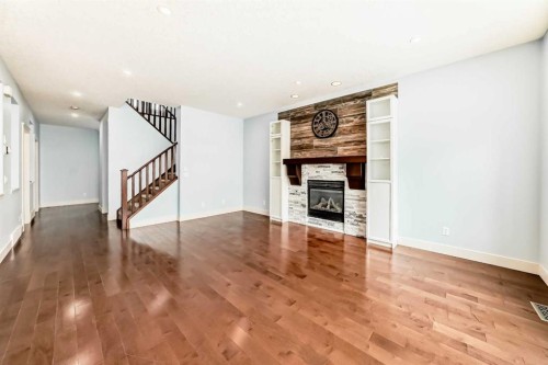 331 Royal Oak Heath Nw, Calgary, AB - Indoor Photo Showing Living Room With Fireplace