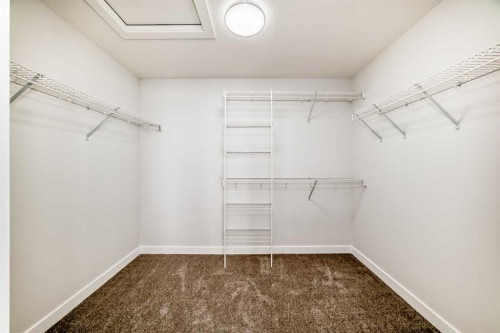 100 Corner Glen Manor Ne, Calgary, AB - Indoor With Storage