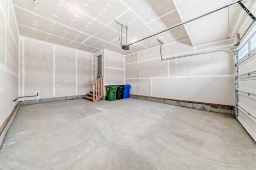 100 Corner Glen Manor Ne, Calgary, AB - Indoor Photo Showing Garage