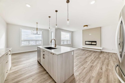 100 Corner Glen Manor Ne, Calgary, AB - Indoor Photo Showing Kitchen With Double Sink With Upgraded Kitchen