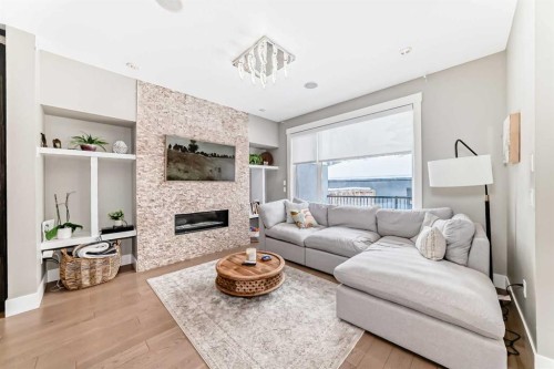 2117 51 Avenue Sw, Calgary, AB - Indoor Photo Showing Living Room With Fireplace