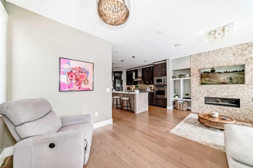 2117 51 Avenue Sw, Calgary, AB - Indoor Photo Showing Living Room With Fireplace