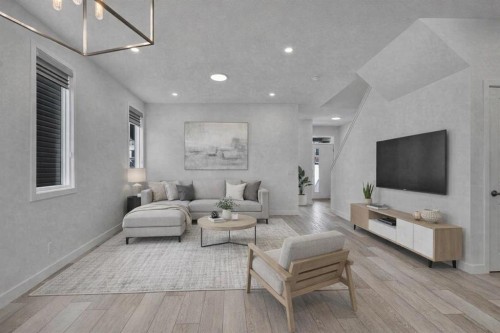 26 Amblehurst Path Nw, Calgary, AB - Indoor Photo Showing Living Room