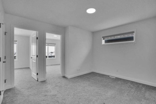 26 Amblehurst Path Nw, Calgary, AB - Indoor Photo Showing Other Room
